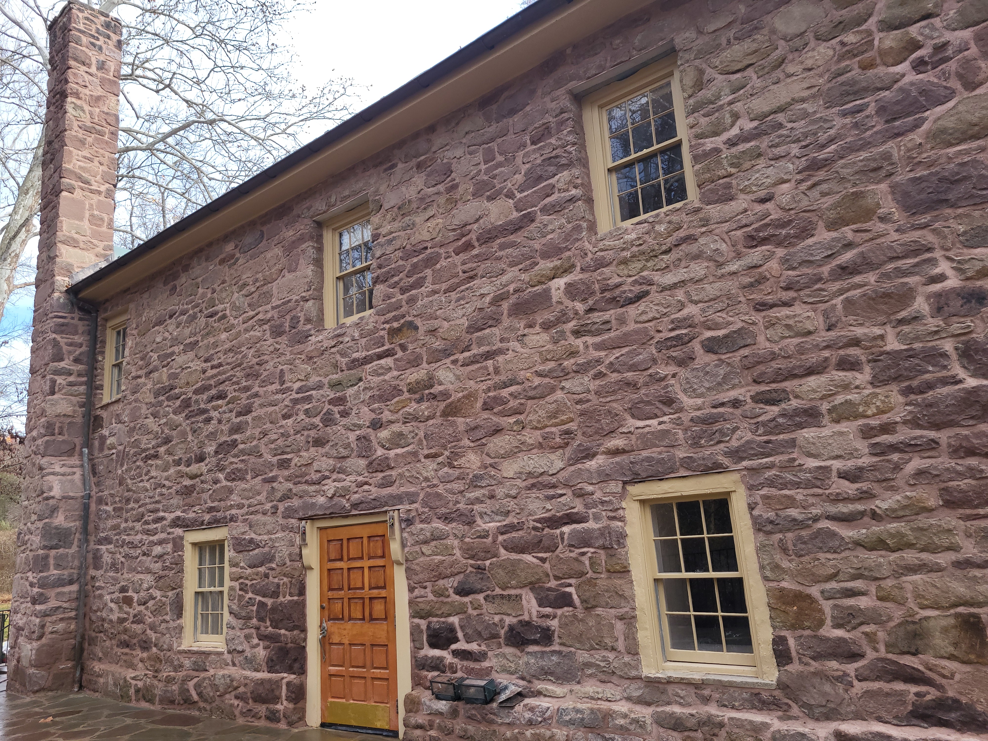 Back of stone house repoint and repair