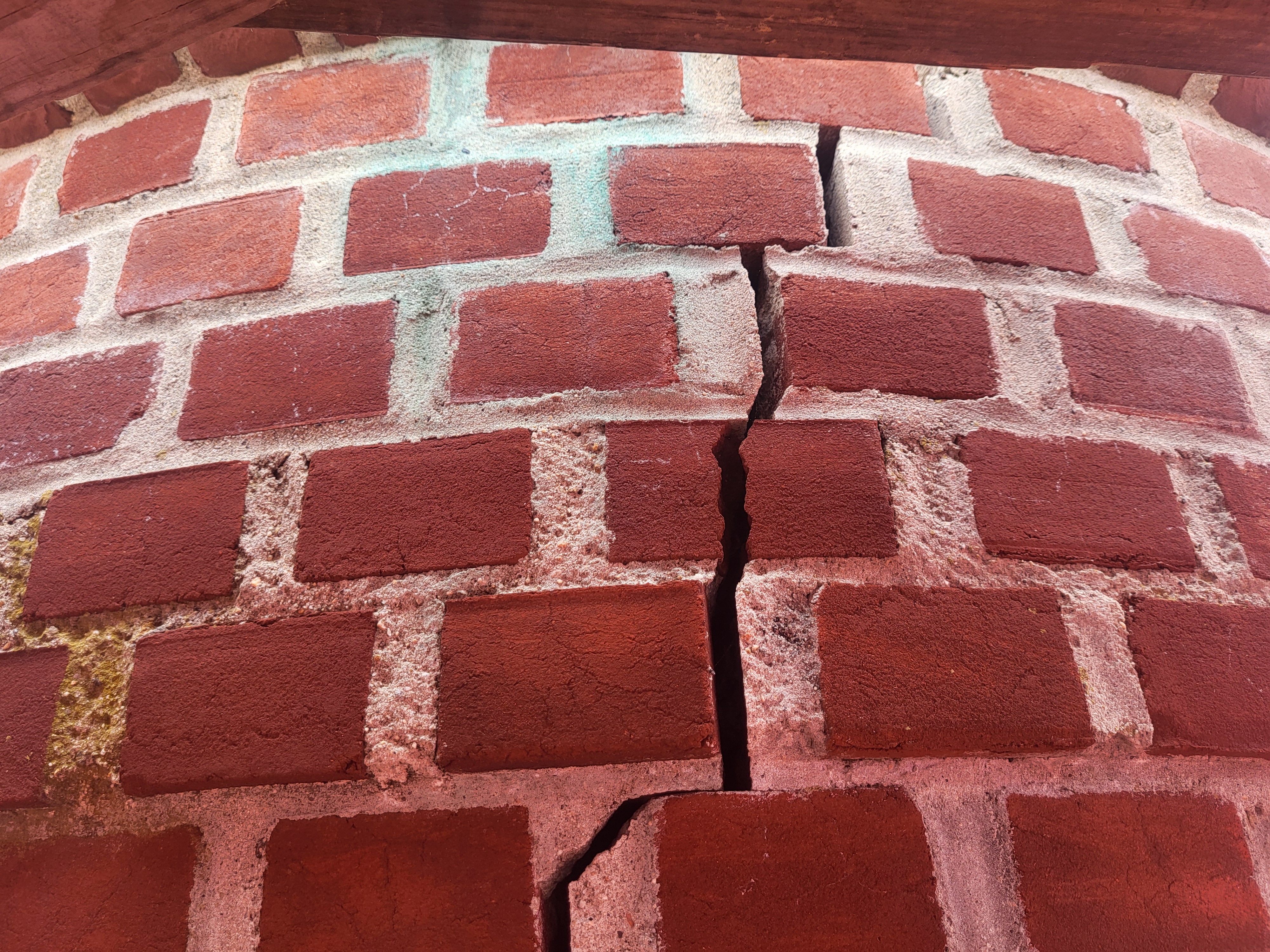 Close up of crack in brick chimney